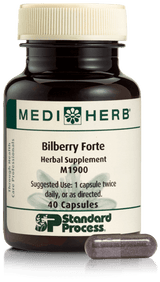 An image of herbal supplement Bilberry Forte next to a capsule.
